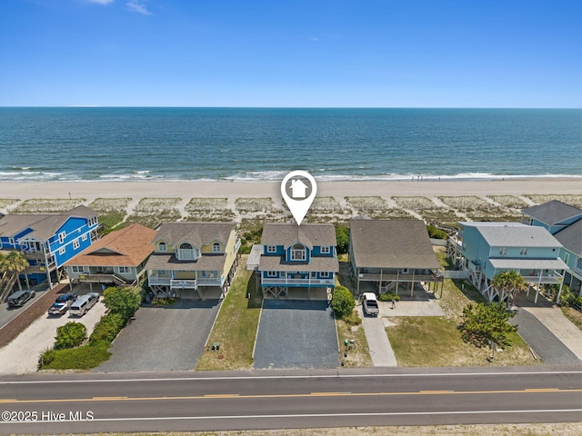 533 Ocean Blvd W, Holden Beach, NC 28462 - aerial perspective of suburban area featuring expansive beach