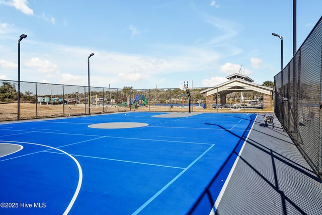 533 Ocean Blvd W, Holden Beach, NC 28462 - view of basketball court with community basketball court and a gazebo