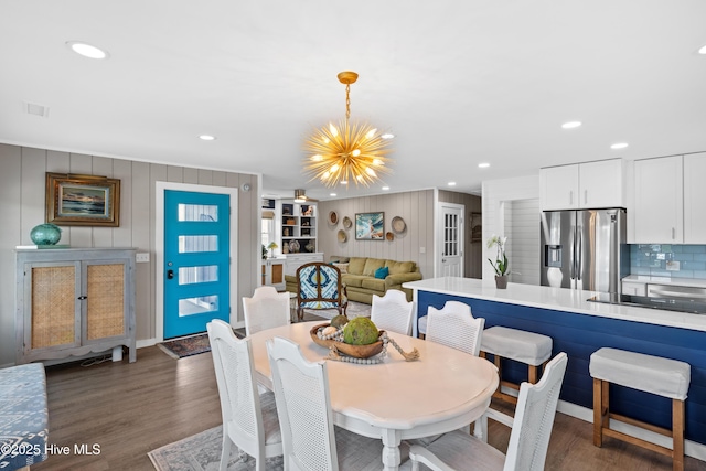 15 Coral Dr, Wrightsville Beach, NC 28480 - dining space featuring a chandelier, wood finished floors, and recessed lighting