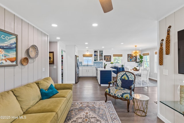 15 Coral Dr, Wrightsville Beach, NC 28480 - living room featuring dark wood-style floors, ceiling fan, recessed lighting, and ornamental molding