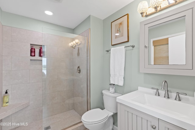 15 Coral Dr, Wrightsville Beach, NC 28480 - bathroom featuring vanity and a tile shower
