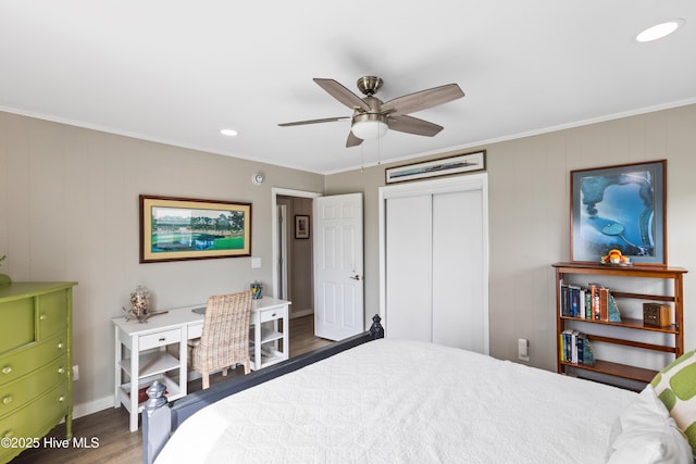 15 Coral Dr, Wrightsville Beach, NC 28480 - bedroom with wood finished floors, crown molding, a closet, ceiling fan, and recessed lighting