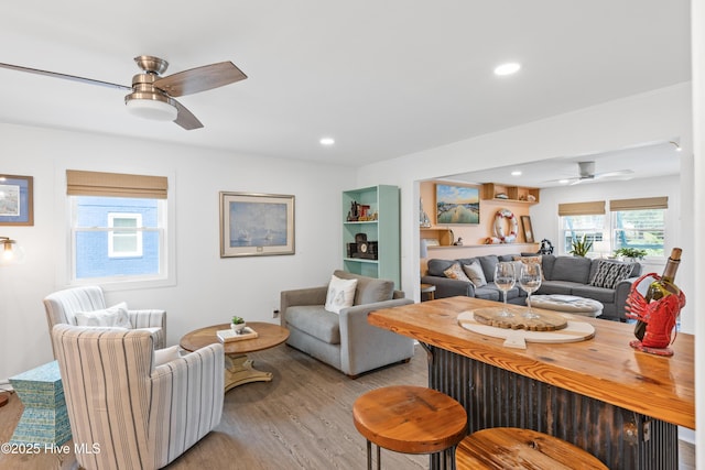 15 Coral Dr, Wrightsville Beach, NC 28480 - living area featuring ceiling fan, wood finished floors, and recessed lighting