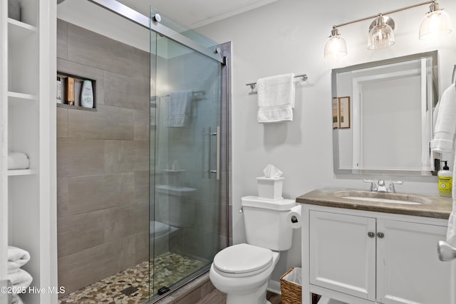 15 Coral Dr, Wrightsville Beach, NC 28480 - full bathroom featuring vanity, a shower stall, and crown molding