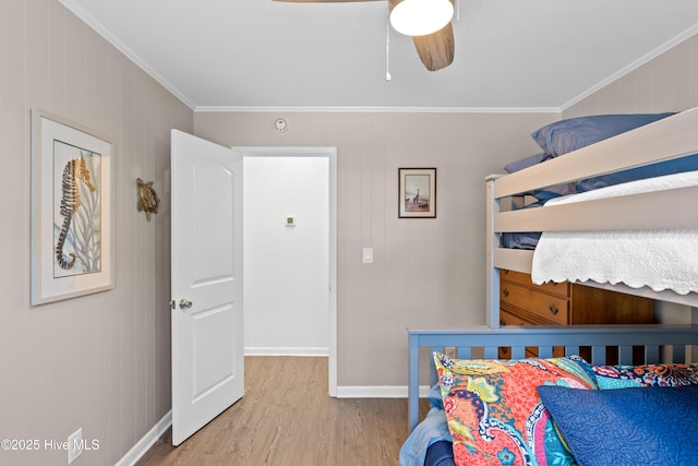 15 Coral Dr, Wrightsville Beach, NC 28480 - bedroom featuring ornamental molding, wood finished floors, and a ceiling fan