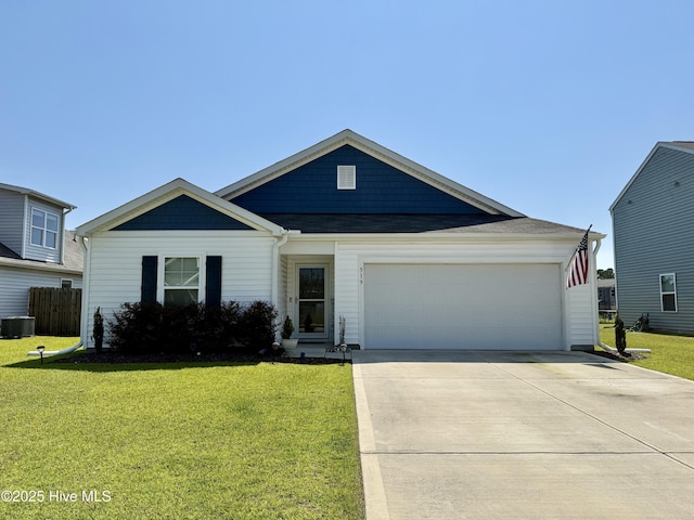 519 Birdsong Dr, Holly Ridge, NC 28445 - ranch-style house with a front yard, a garage, and concrete driveway