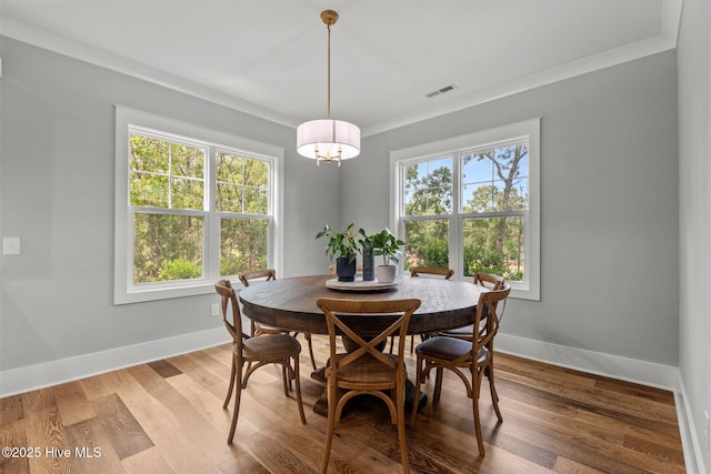 28 Kahkwa Trl, Pinehurst, NC 28374 - dining area with crown molding and light wood-style floors