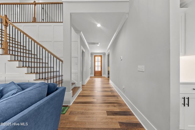 28 Kahkwa Trl, Pinehurst, NC 28374 - entrance foyer with wood finished floors, stairs, and crown molding