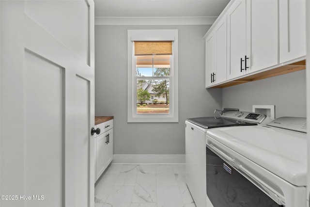 28 Kahkwa Trl, Pinehurst, NC 28374 - laundry room with cabinet space, washing machine and clothes dryer, and light marble finish floors