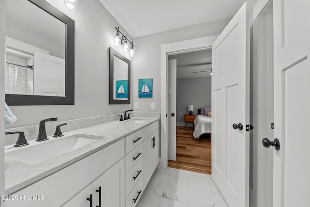 28 Kahkwa Trl, Pinehurst, NC 28374 - ensuite bathroom with double vanity and marble look tile flooring