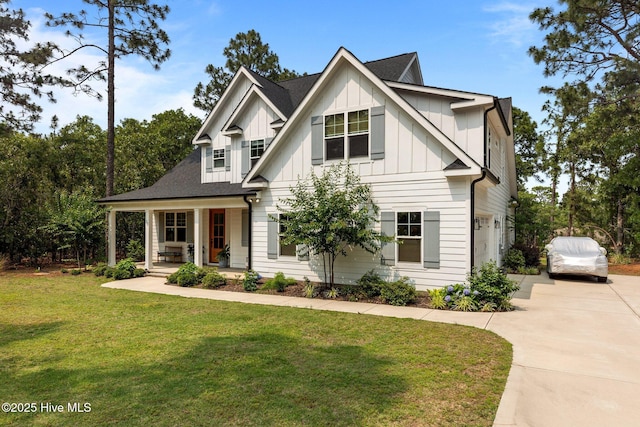 28 Kahkwa Trl, Pinehurst, NC 28374 - modern inspired farmhouse featuring covered porch, concrete driveway, board and batten siding, and a front yard