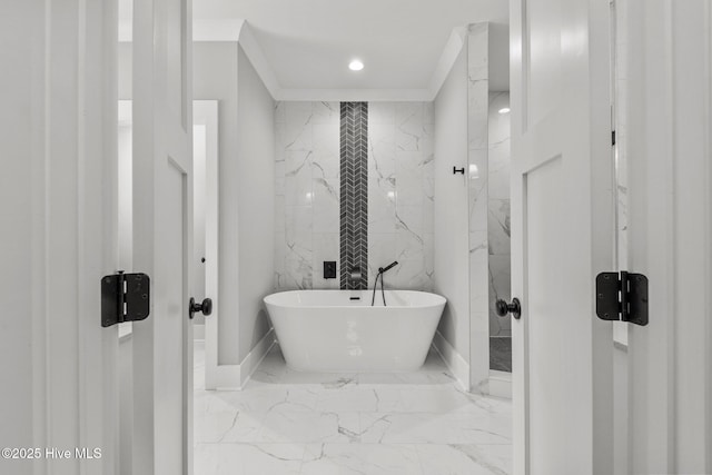 28 Kahkwa Trl, Pinehurst, NC 28374 - bathroom with a freestanding bath, marble tiled floors, and recessed lighting