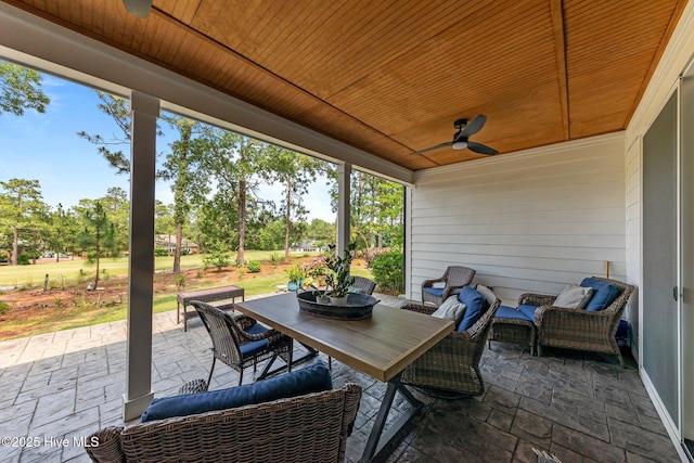 28 Kahkwa Trl, Pinehurst, NC 28374 - view of patio / terrace with ceiling fan, outdoor dining space, and view of scattered trees