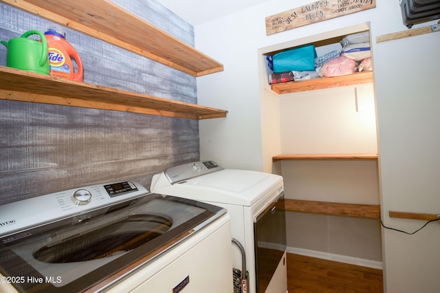 457 Loblolly Dr, Vass, NC 28394 - washroom featuring washer and clothes dryer and wood finished floors
