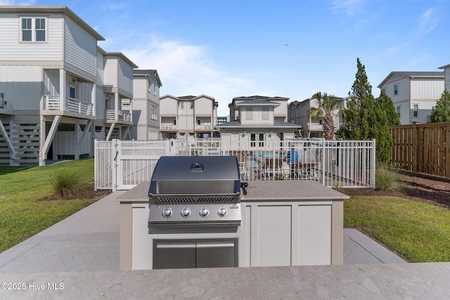 207 Spartanburg Ave Unit 1 & 2, Carolina Beach, NC 28428 - view of patio / terrace with a residential view and a grill