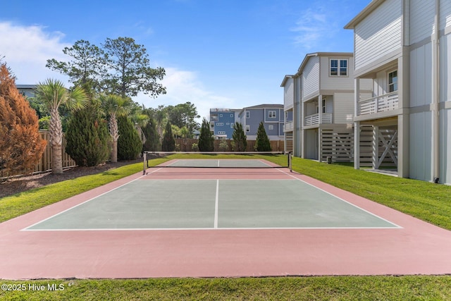 207 Spartanburg Ave Unit 1 & 2, Carolina Beach, NC 28428 - view of tennis court featuring community basketball court and a residential view