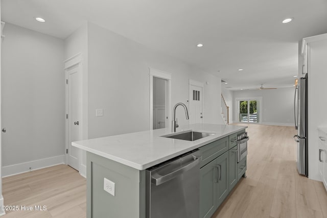 207 Spartanburg Ave Unit 1 & 2, Carolina Beach, NC 28428 - kitchen with stainless steel appliances, light wood-style floors, ceiling fan, an island with sink, and recessed lighting