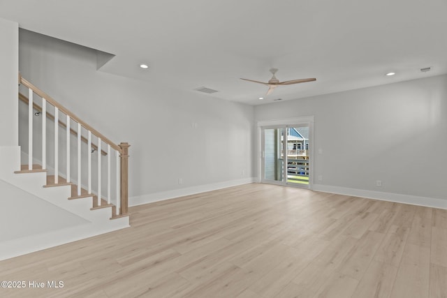 207 Spartanburg Ave Unit 1 & 2, Carolina Beach, NC 28428 - unfurnished living room featuring recessed lighting, light wood-type flooring, a ceiling fan, and stairs