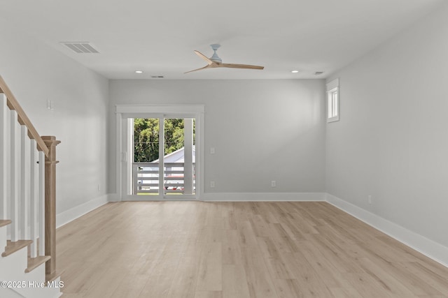 207 Spartanburg Ave Unit 1 & 2, Carolina Beach, NC 28428 - empty room with stairs, light wood-type flooring, ceiling fan, and recessed lighting