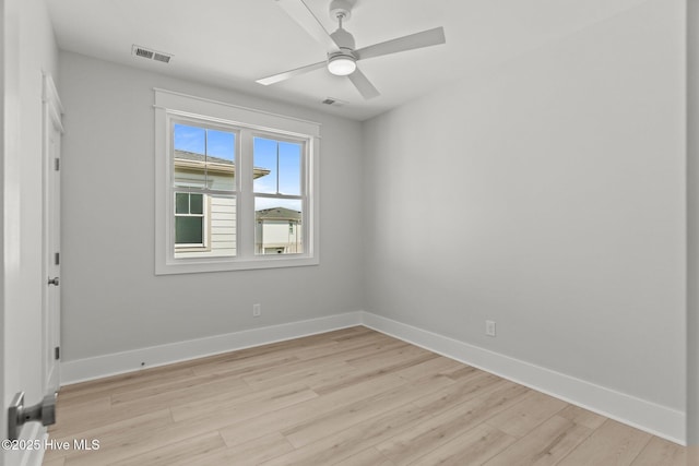 207 Spartanburg Ave Unit 1 & 2, Carolina Beach, NC 28428 - empty room featuring light wood-style flooring and ceiling fan