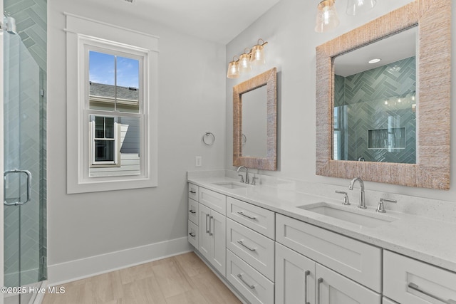 207 Spartanburg Ave Unit 1 & 2, Carolina Beach, NC 28428 - bathroom with double vanity and a shower stall