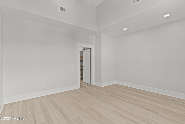 207 Spartanburg Ave Unit 1 & 2, Carolina Beach, NC 28428 - spare room featuring light wood-style flooring and recessed lighting