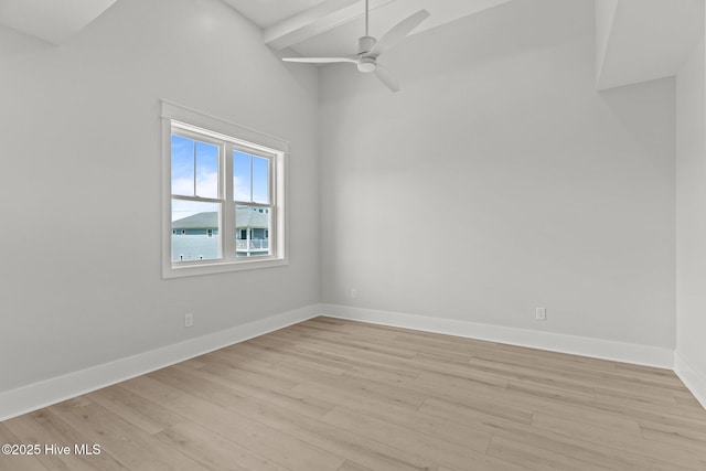 207 Spartanburg Ave Unit 1 & 2, Carolina Beach, NC 28428 - spare room featuring light wood-style flooring, ceiling fan, and beam ceiling