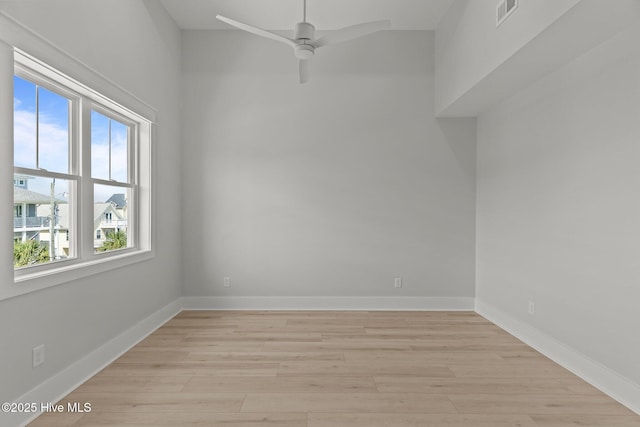 207 Spartanburg Ave Unit 1 & 2, Carolina Beach, NC 28428 - spare room with light wood-type flooring and a ceiling fan
