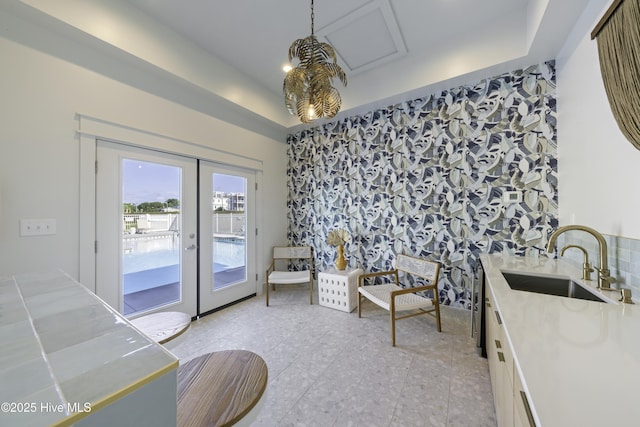 207 Spartanburg Ave Unit 1 & 2, Carolina Beach, NC 28428 - living area featuring french doors and a raised ceiling