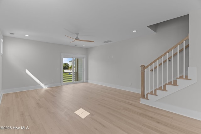 207 Spartanburg Ave Unit 1 & 2, Carolina Beach, NC 28428 - unfurnished living room featuring ceiling fan, light wood-style flooring, stairs, and recessed lighting