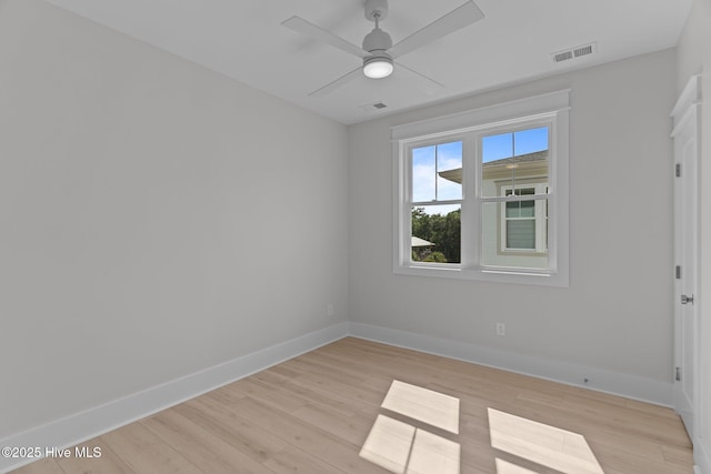 207 Spartanburg Ave Unit 1 & 2, Carolina Beach, NC 28428 - empty room featuring light wood-style floors and a ceiling fan