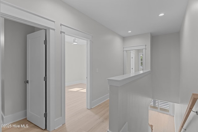 207 Spartanburg Ave Unit 1 & 2, Carolina Beach, NC 28428 - hallway with an upstairs landing, light wood finished floors, and recessed lighting