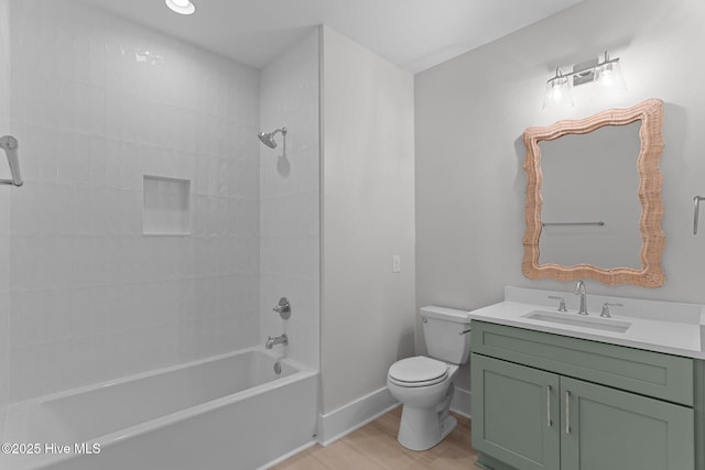 207 Spartanburg Ave Unit 1 & 2, Carolina Beach, NC 28428 - full bathroom with vanity, wood finished floors, and  shower combination