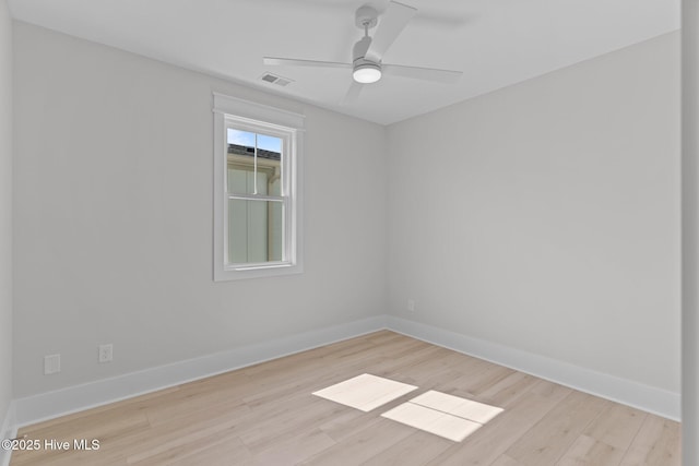 207 Spartanburg Ave Unit 1 & 2, Carolina Beach, NC 28428 - unfurnished room featuring wood finished floors and ceiling fan