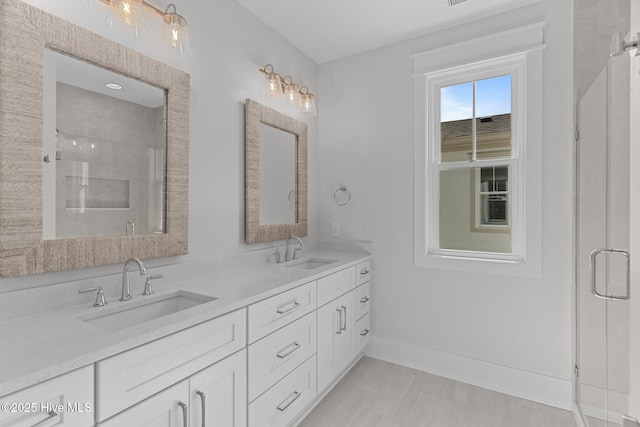 207 Spartanburg Ave Unit 1 & 2, Carolina Beach, NC 28428 - bathroom with double vanity and a stall shower