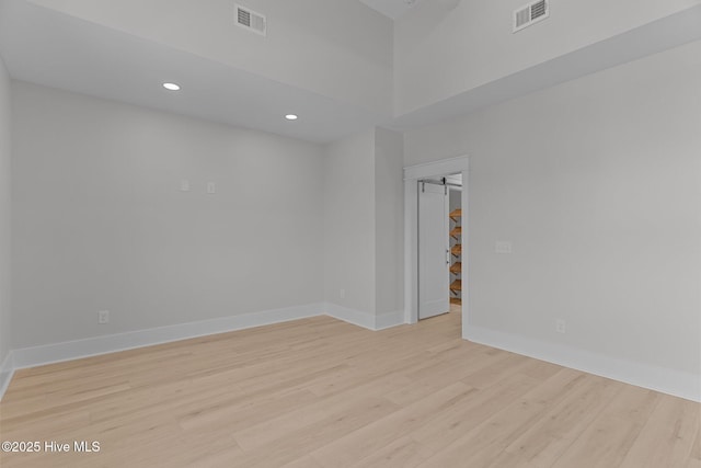 207 Spartanburg Ave Unit 1 & 2, Carolina Beach, NC 28428 - spare room with light wood finished floors and recessed lighting