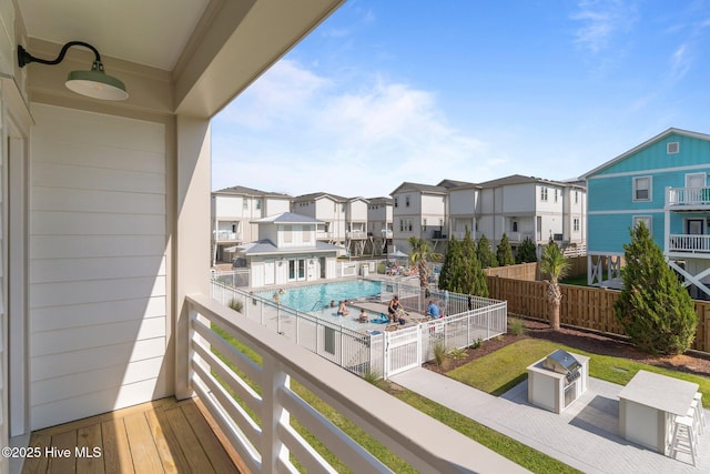 207 Spartanburg Ave Unit 1 & 2, Carolina Beach, NC 28428 - balcony with a residential view and view of pool area