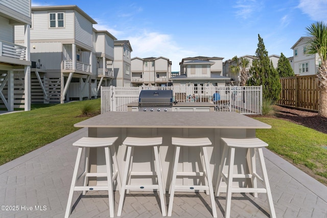 207 Spartanburg Ave Unit 1 & 2, Carolina Beach, NC 28428 - view of patio / terrace with a residential view and exterior kitchen