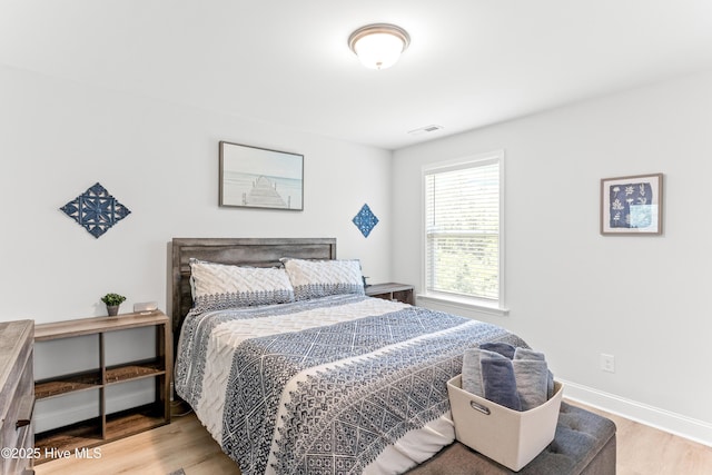 2526 Longleaf Pine Cir, Leland, NC 28451 - bedroom featuring wood finished floors