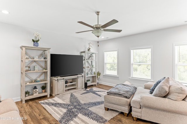 2526 Longleaf Pine Cir, Leland, NC 28451 - living area featuring plenty of natural light, ceiling fan, wood finished floors, and recessed lighting