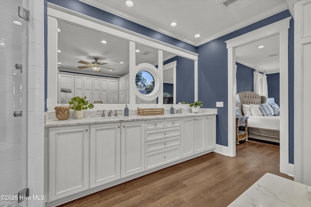318 Cabbage Inlet Ln, Wilmington, NC 28409 - bathroom featuring ensuite bathroom, double vanity, wood finished floors, a ceiling fan, and recessed lighting