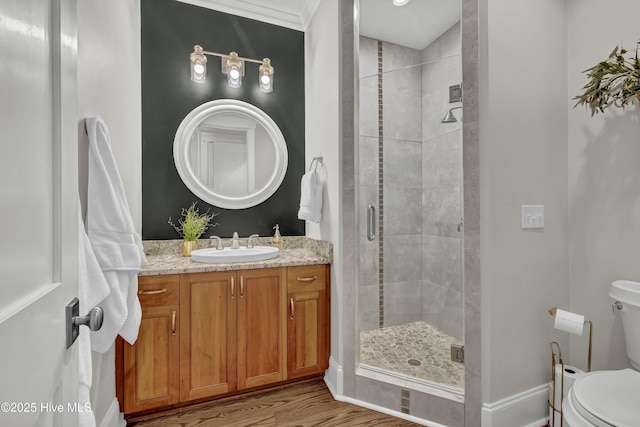 318 Cabbage Inlet Ln, Wilmington, NC 28409 - full bath featuring vanity, a stall shower, wood finished floors, and crown molding