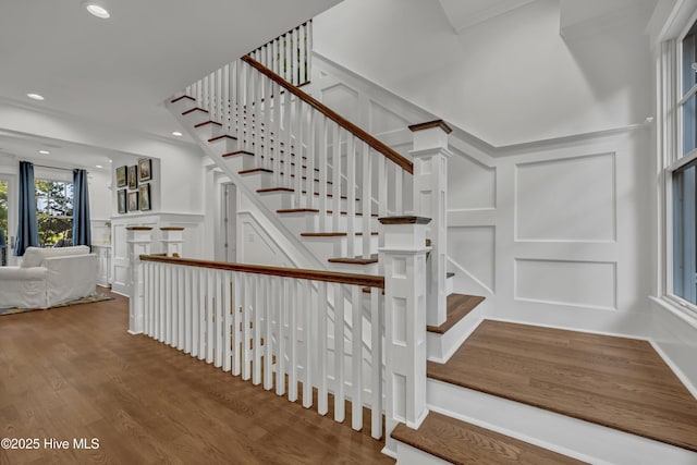 318 Cabbage Inlet Ln, Wilmington, NC 28409 - stairs with a decorative wall, wood finished floors, recessed lighting, and crown molding