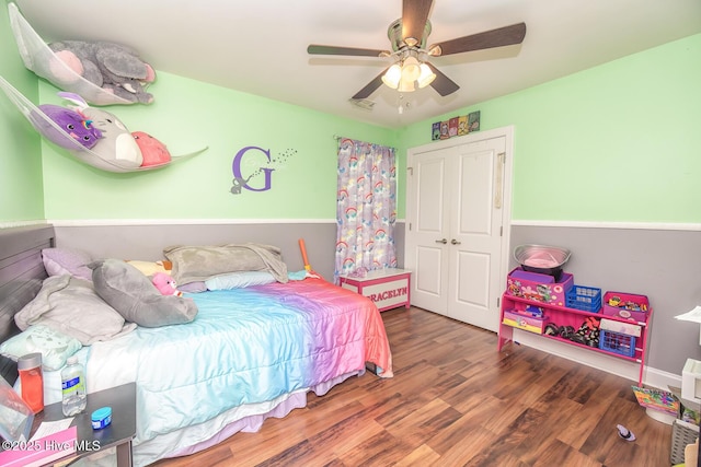 1247 Dunlop Dr NE, Leland, NC 28451 - bedroom featuring wood finished floors, a closet, and ceiling fan