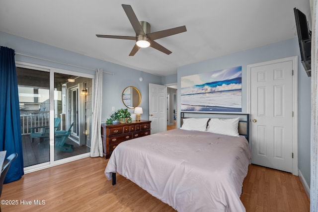 8202 5th Ave, North Topsail Beach, NC 28460 - bedroom with access to outside, wood finished floors, and ceiling fan
