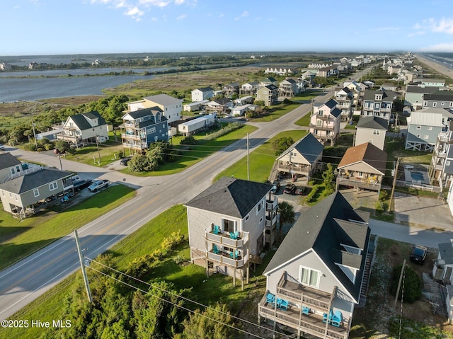 8202 5th Ave, North Topsail Beach, NC 28460 - aerial perspective of suburban area with a nearby body of water