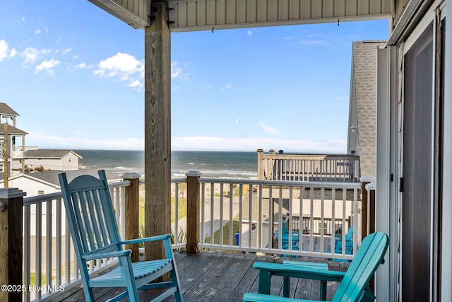8202 5th Ave, North Topsail Beach, NC 28460 - balcony featuring view of water and beach