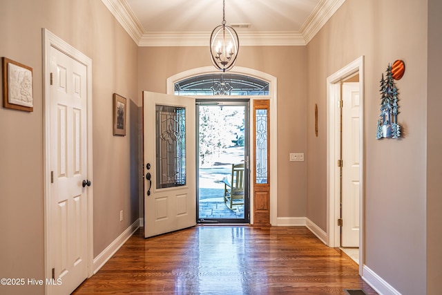 56 Kilbride Dr, Pinehurst, NC 28374 - entryway featuring a chandelier, ornamental molding, and wood finished floors