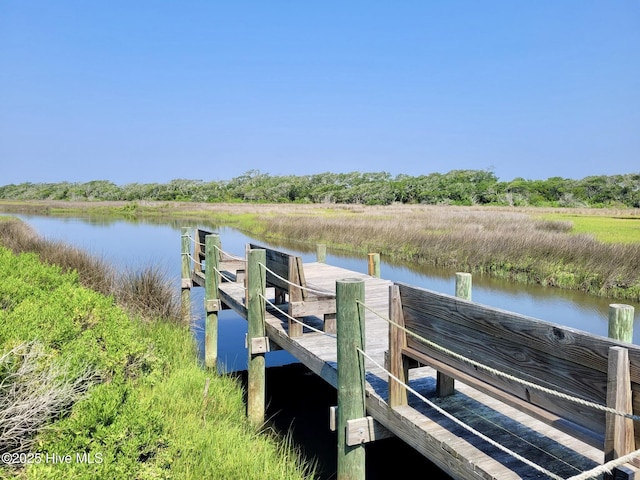 301 Mandalay Ct Unit F, Surf City, NC 28445 - dock featuring a water view