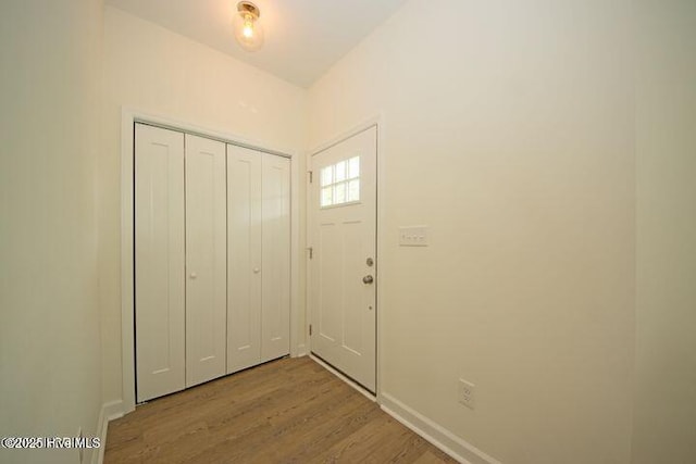 146 Poplar St, Jacksonville, NC 28540 - entrance foyer featuring wood finished floors and baseboards